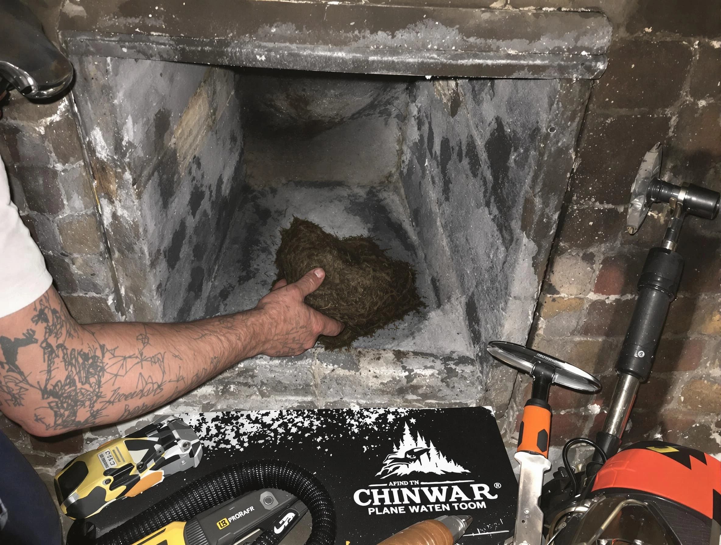 Murfreesboro Chimney Sweep safely removing debris and screening chimney in Murfreesboro, TN